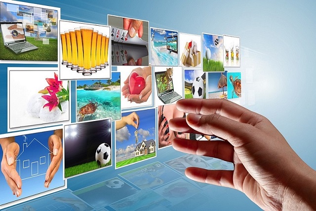 Streaming multimedia screen with reaching hand.
